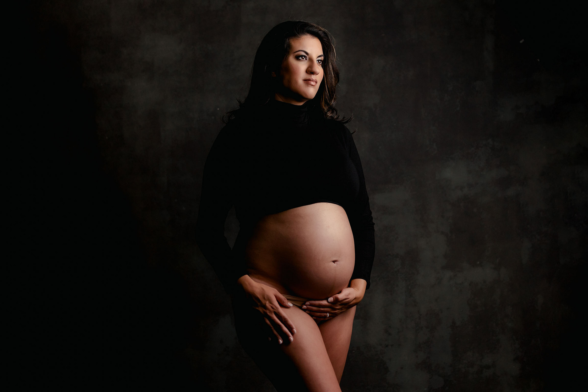 Bare Belly Pregnancy Photo with Black Croptop in San Diego Photo Studio