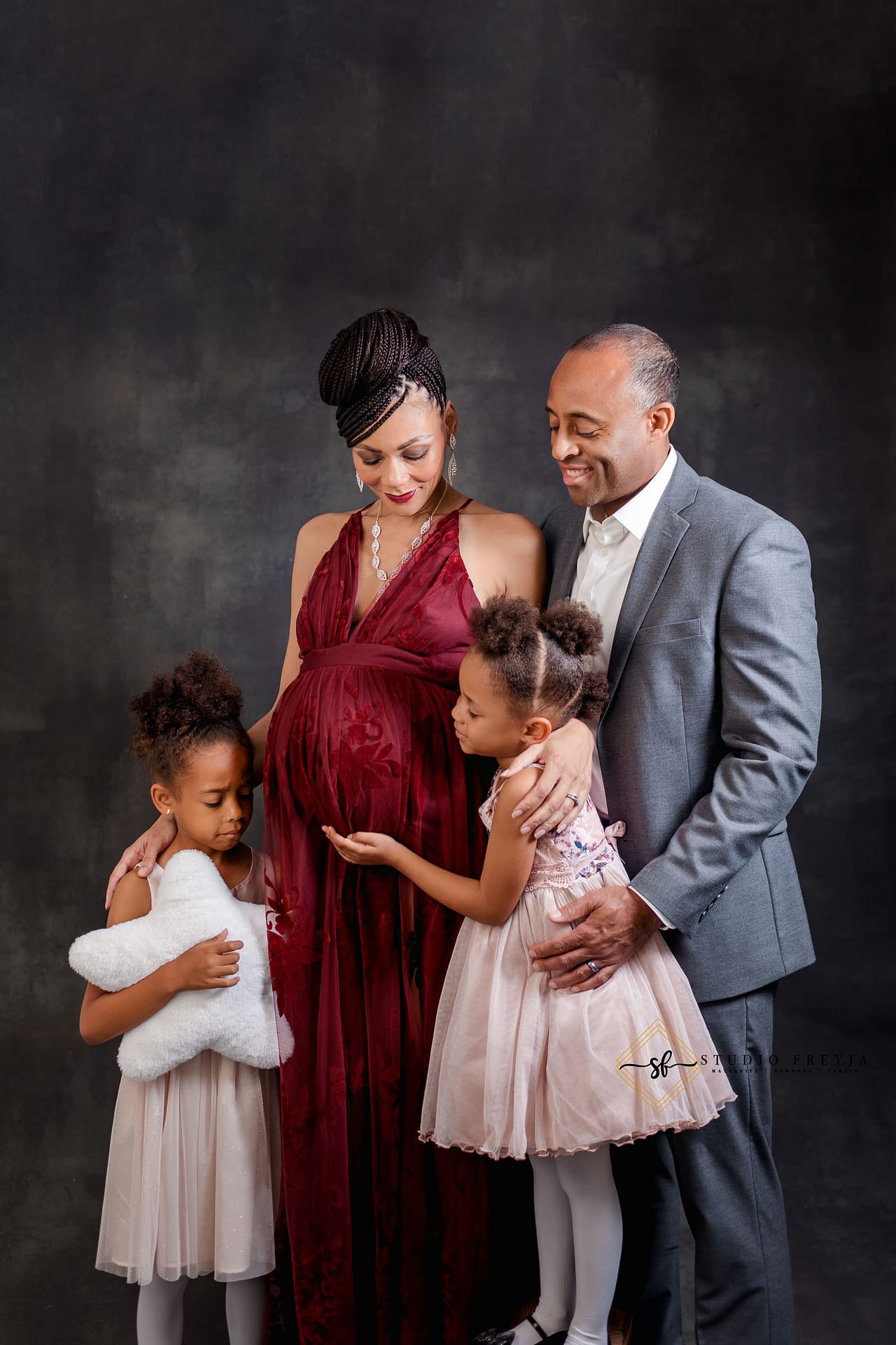 Full family picture during maternity session in San Diego Maternity Photography Studio