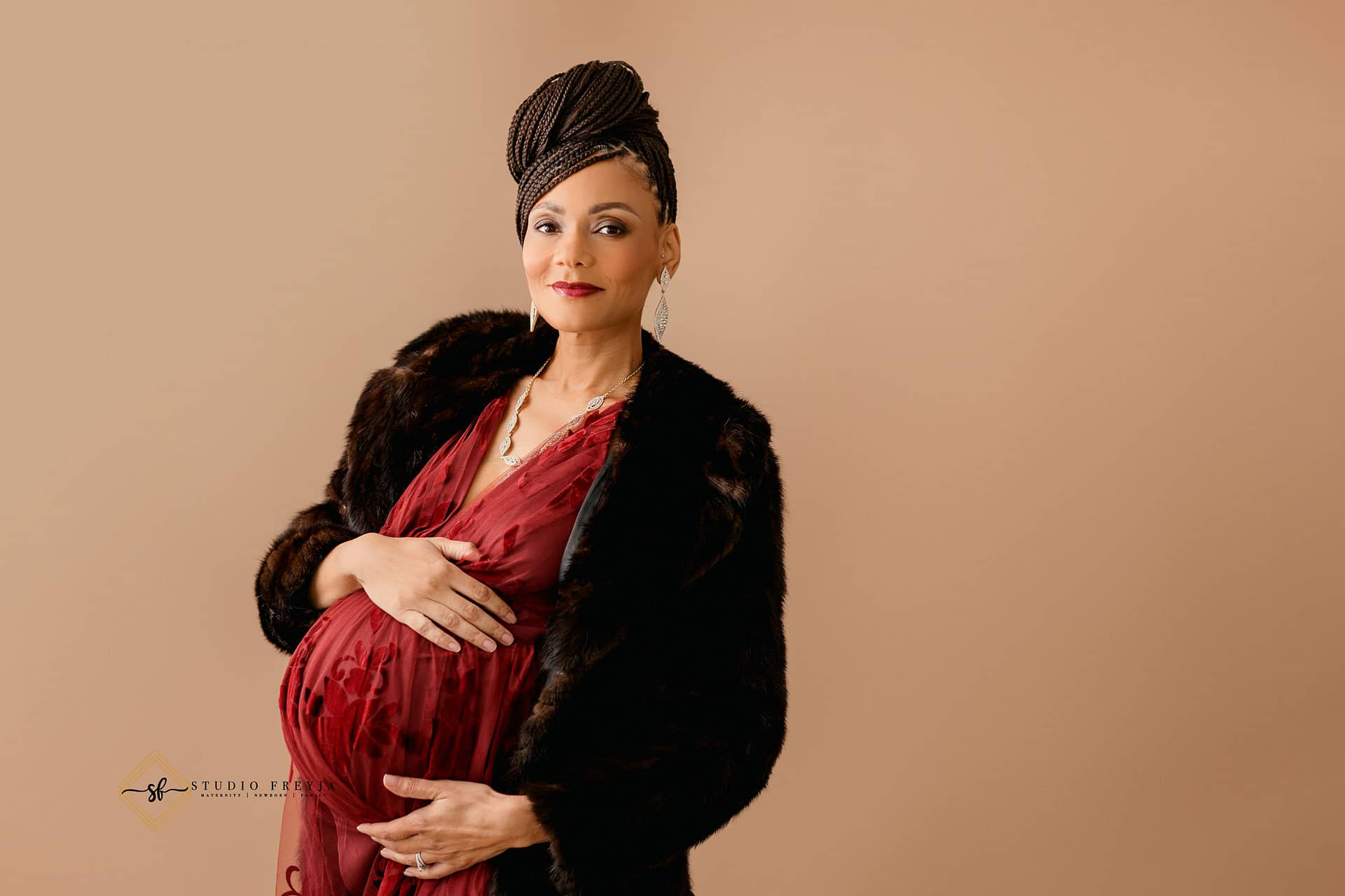 Single portrait of mom during maternity portraits in San Diego Photography Studio