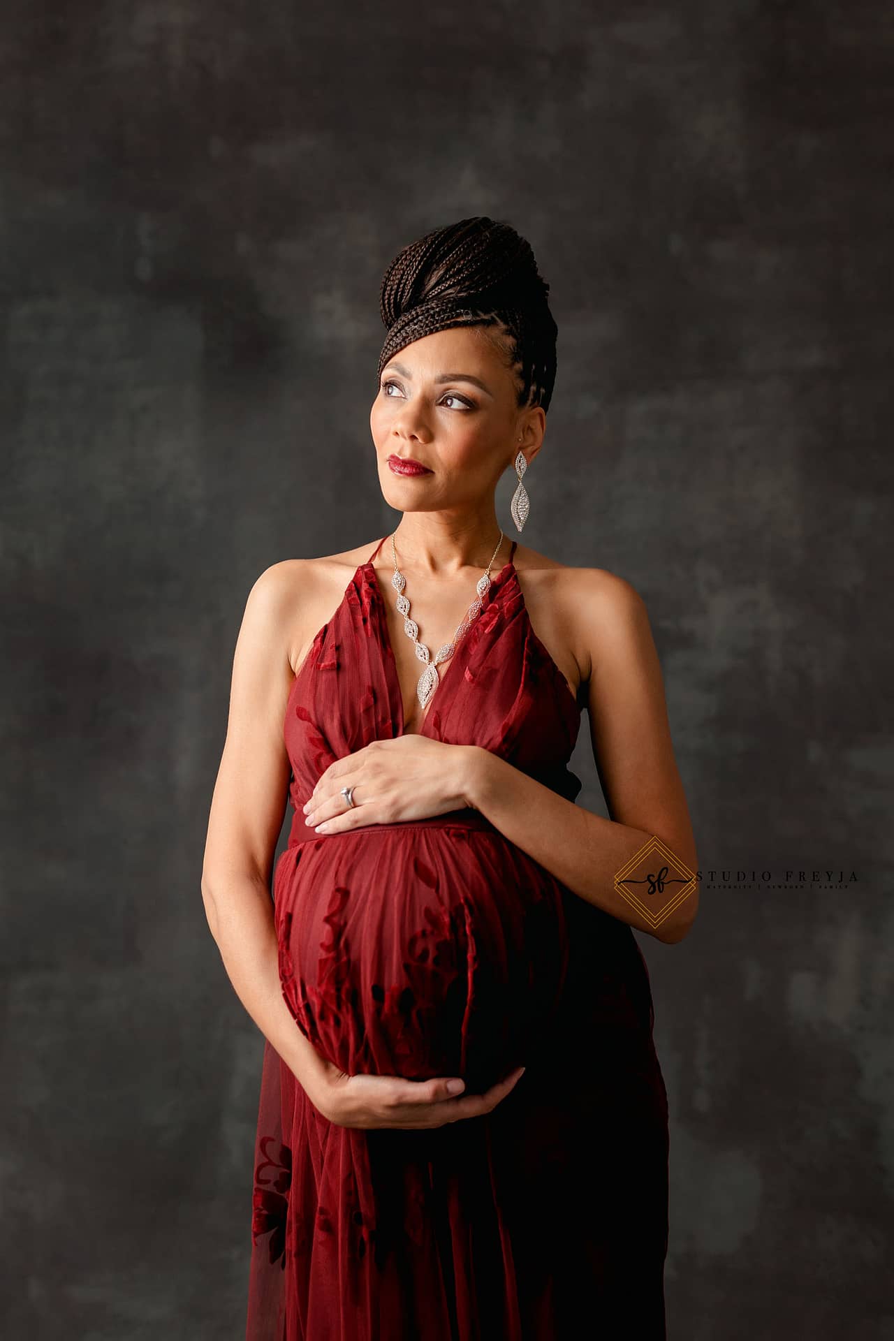 Beautiful portrait of a mom-to-be during her special studio maternity session
